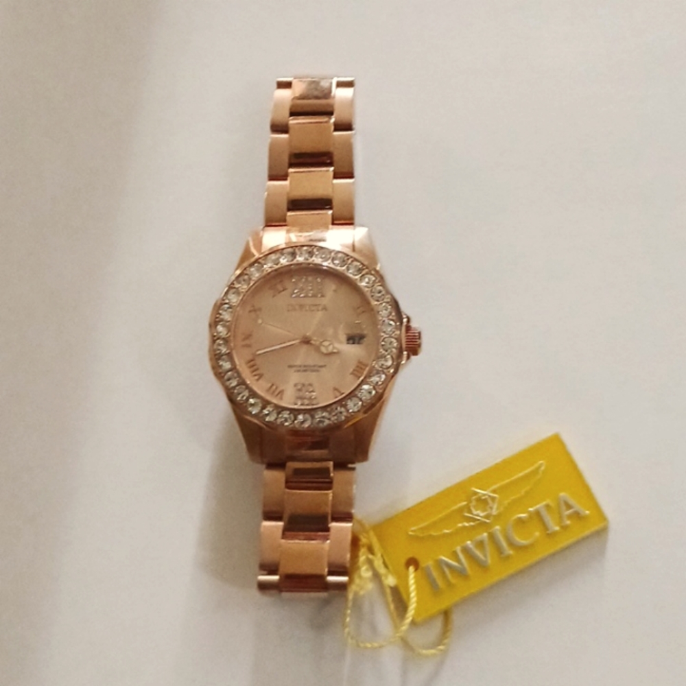 Invicta woman's watch, rose. Never worn.